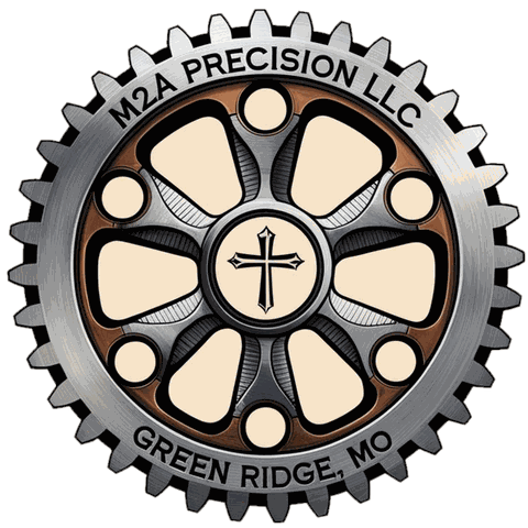 M2A Precision LLC logo: steel gear with copper ring and cross, Green Ridge, MO